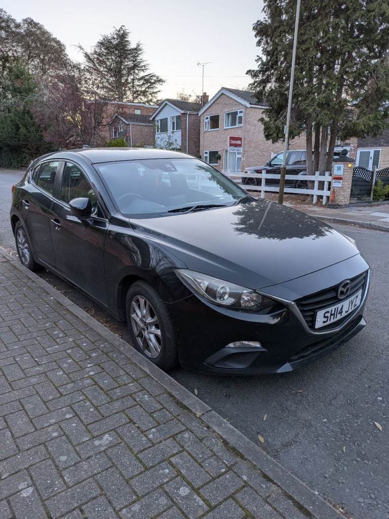 2014 Mazda 3 - 84,000 miles 