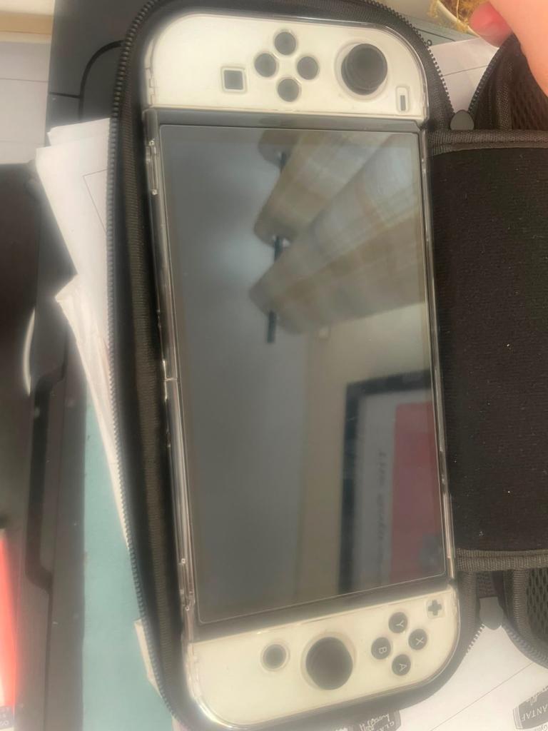 Nintendo Switch OLED + Games and Case - Great Condition