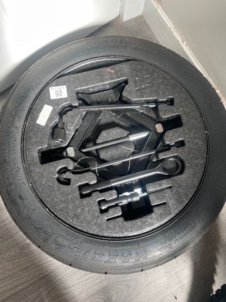 Spare wheel with tools 