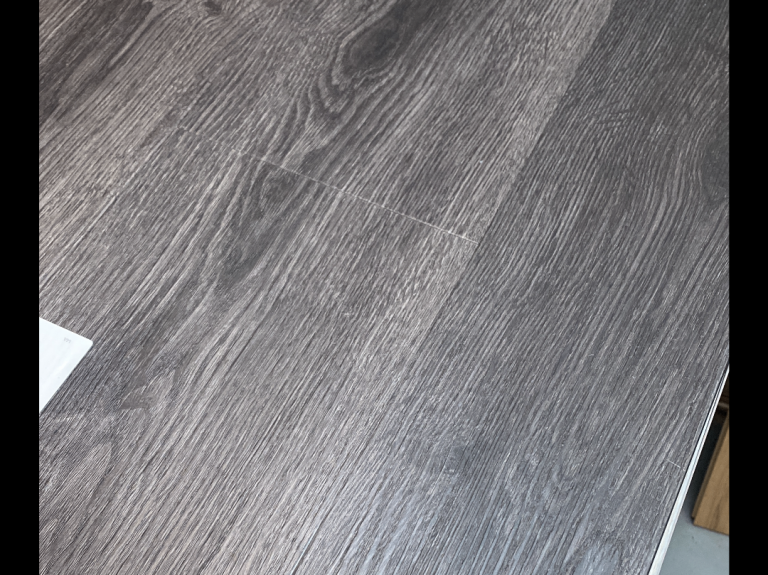 Brand new dark grey vinyl click flooring 