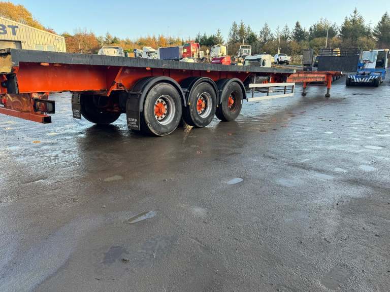 SLEMISH 21M FLAT BED EXTENDER FLAT TRAILER REAR STEER AXLE AND FRONT LIFT 