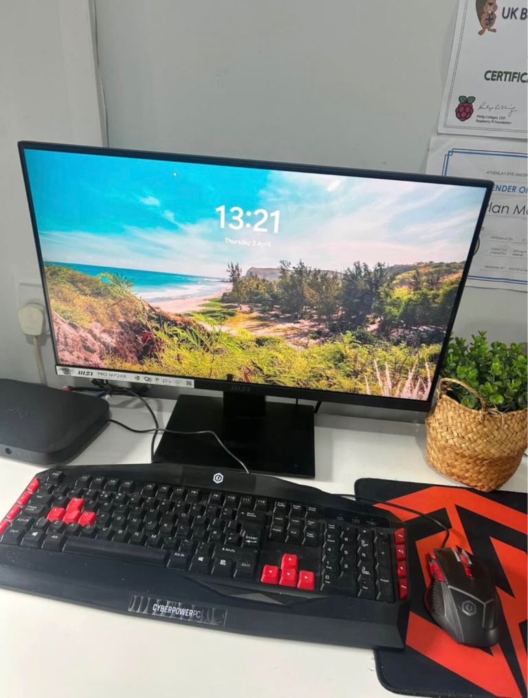 MSI Gaming PC Setup with Monitor, Keyboard, and Mouse