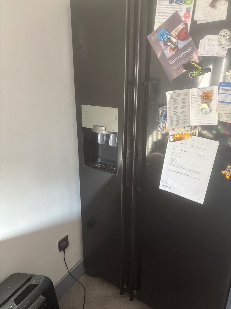 Samsung fridge/freezer in black for sale 