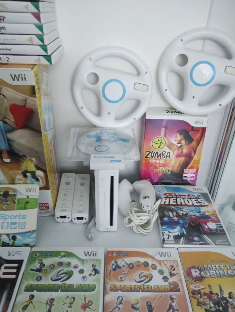 Nintendo Wii Console With Boxed Family Trainer 25 Games And Accessories In Good Condition £100