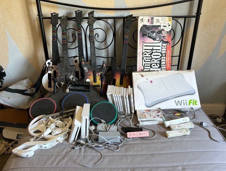 Nintendo Wii Console Bundle with Games, Guitars, and Accessories