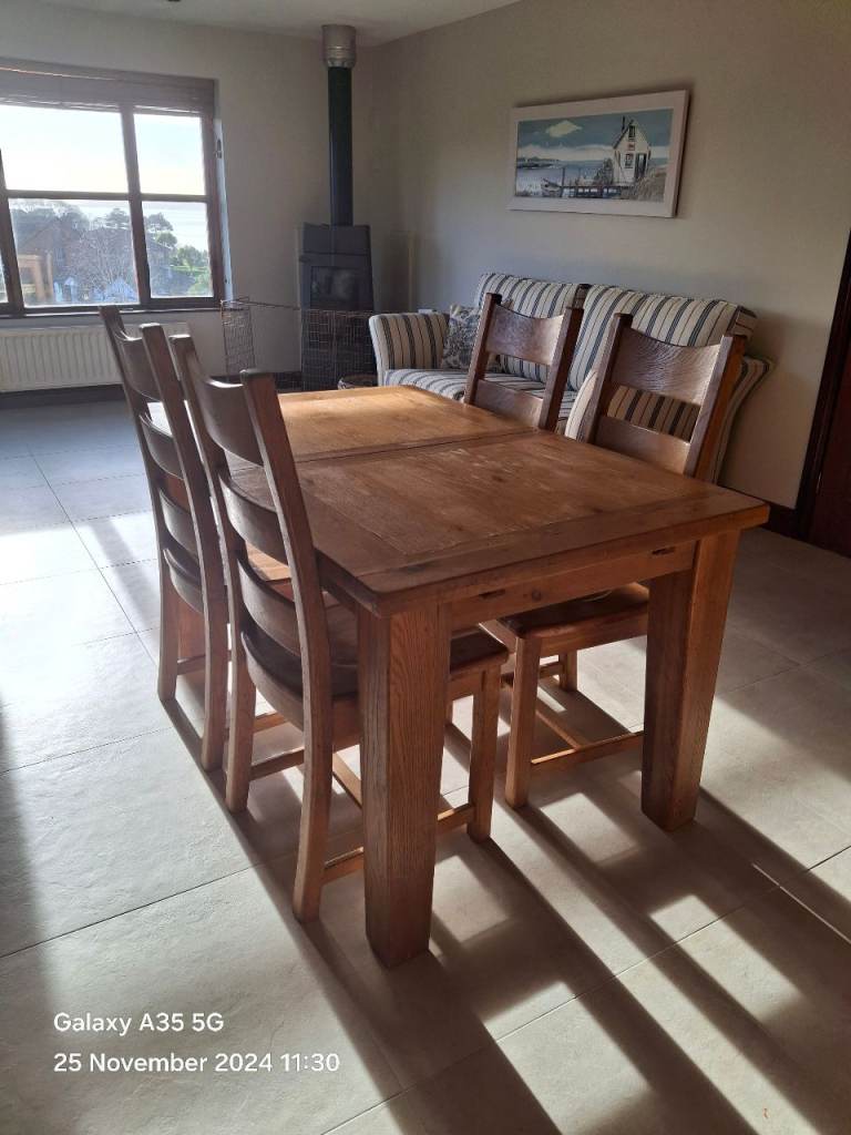 Used wooden kitchen table and 4 chairs
