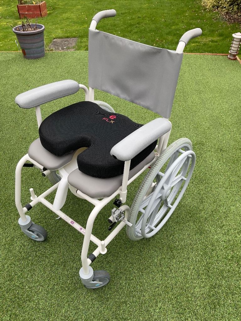 NEW Freeway T70 Shower chair with commode etc. New and unused.