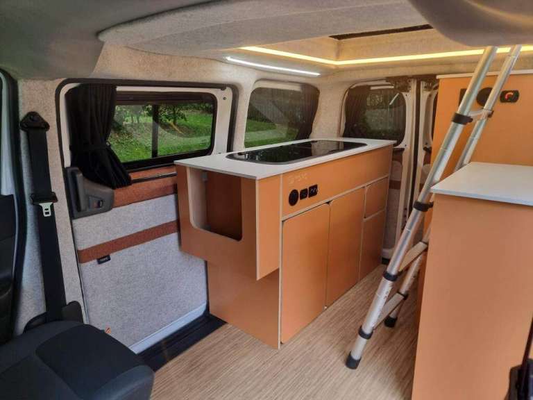Nissan NV200 Camper Van with new Professional Conversion with Integral Roof Tent and Inside Access.
