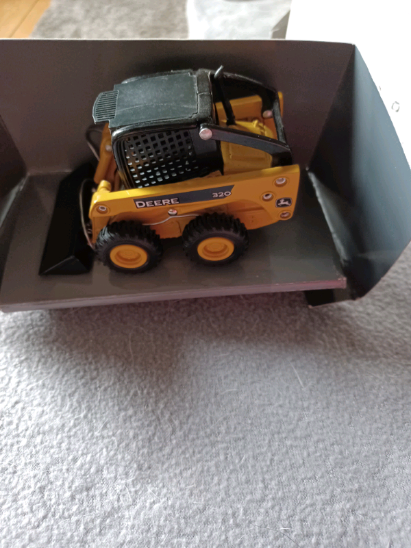 John deere Britains /Ertl 320 skid steere
