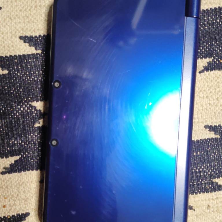 metallic blue new Nintendo 3ds XL with cfw, charger, 6 games and 32gb SD card