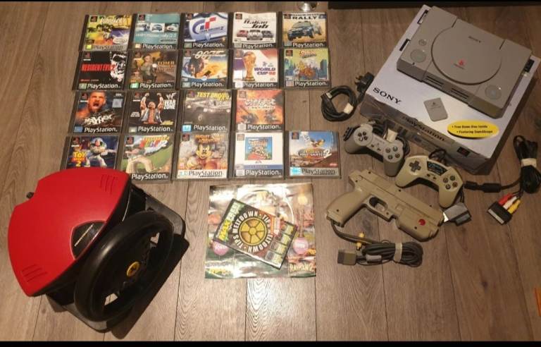 Sony PlayStation 1 Console Bundle With Games 19 games  streering Wheel  2 Controllers Memory card 