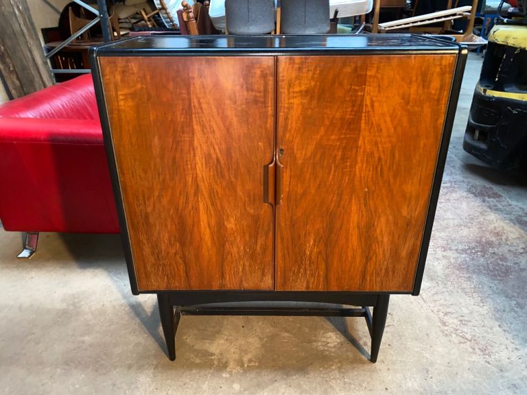 A MIDCENTURY TEAK AND BLACK EBONIZED WOOD DRINKS/COCKTAIL CABINET ,GREAT CONDITION,DELIVERY