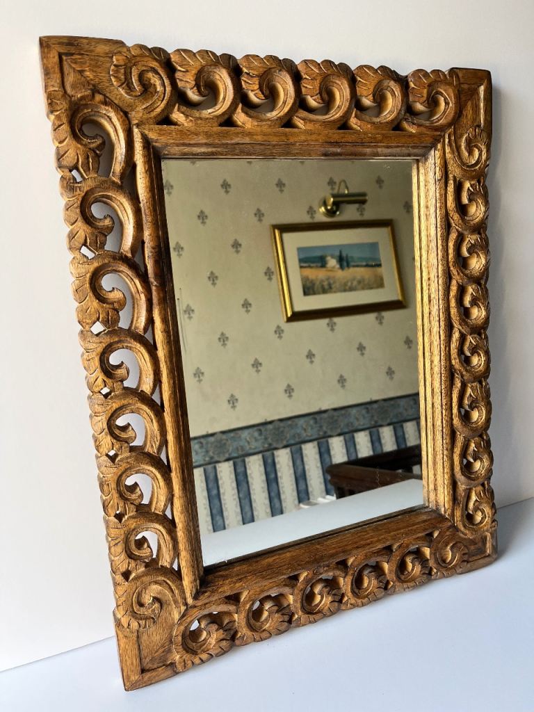 Carved wooden mirror 
