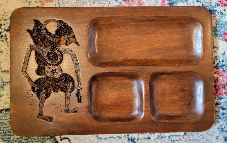Indonesian batik stamp inside a wooden tray