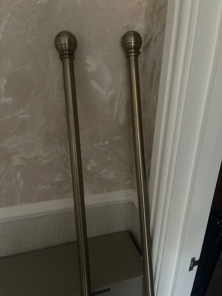 Antique curtain pole 
