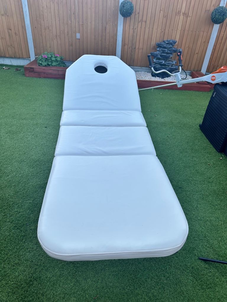 White faux leather treatment bed. Foldable in bag. Lash tech. Brows. Massage.