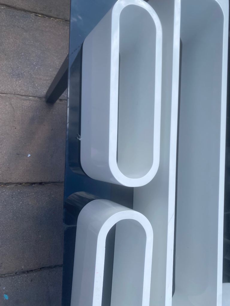 White Wall-Mounted Shelving Unit – Good Condition