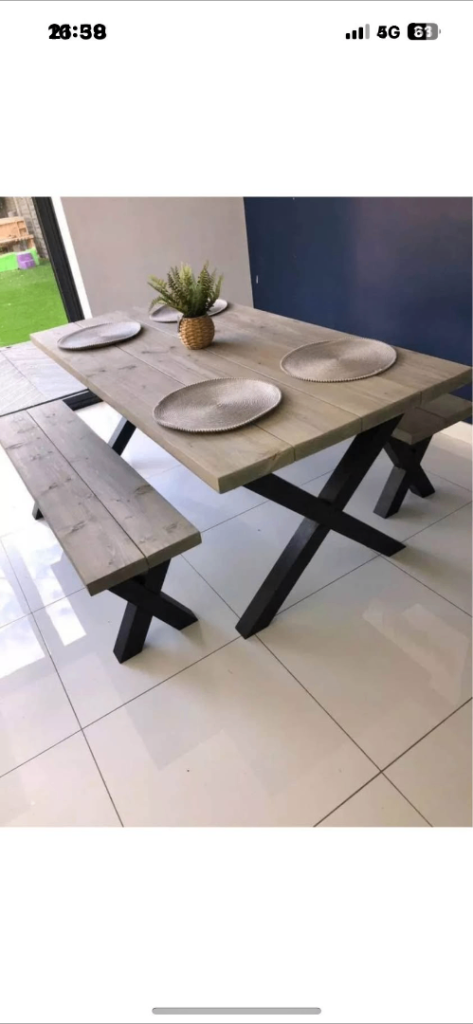 Rustic reclaimed timber dining table and benches 