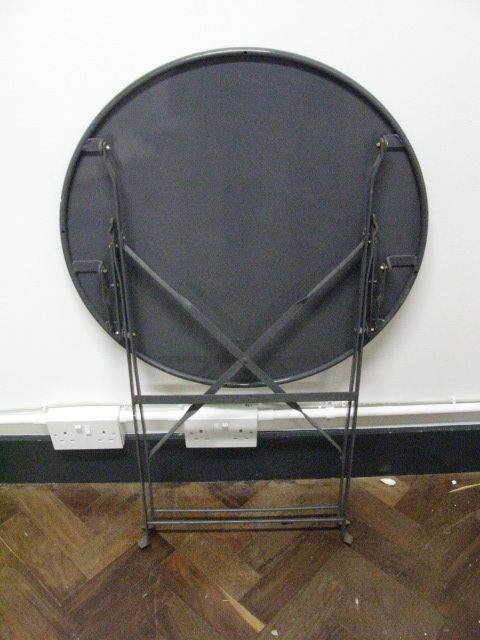 Folding Table . Round top . Made of metal