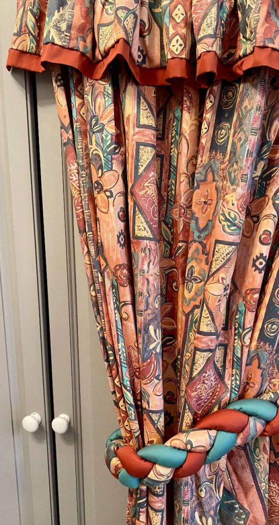 1 pr of pre-owned curtains with pelmet and plaited tie-backs