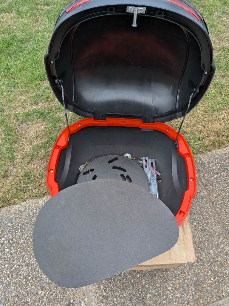 Brand new unbranded motorcycle top box with mounting fittings and key