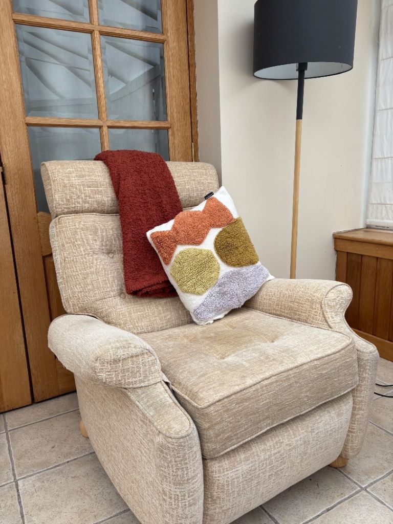Cream single chair recliner with arm cover