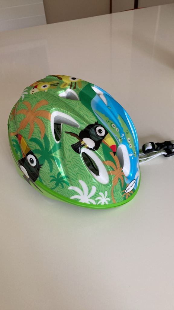 NEW,Schwinn  never worn small children’sbike helmet. Size 44-50 ages 2-4 green jungle.