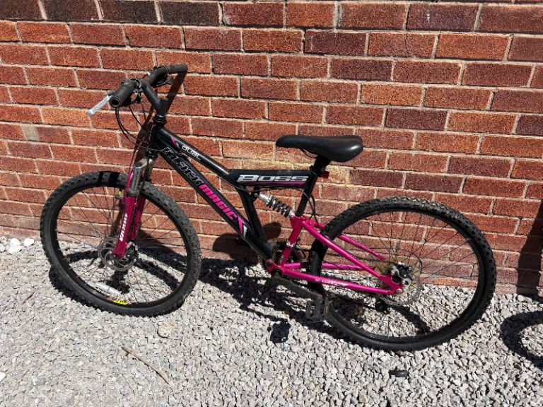 Older girls, ladies Black Magic, dual suspension mountain bike, 23” wheels 