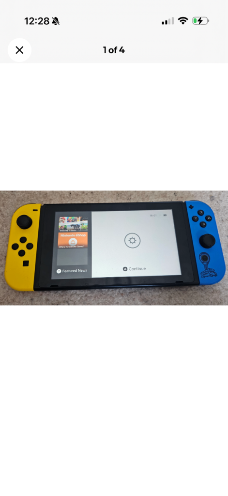 Nintendo Switch Console with Yellow and Blue Joy-Cons