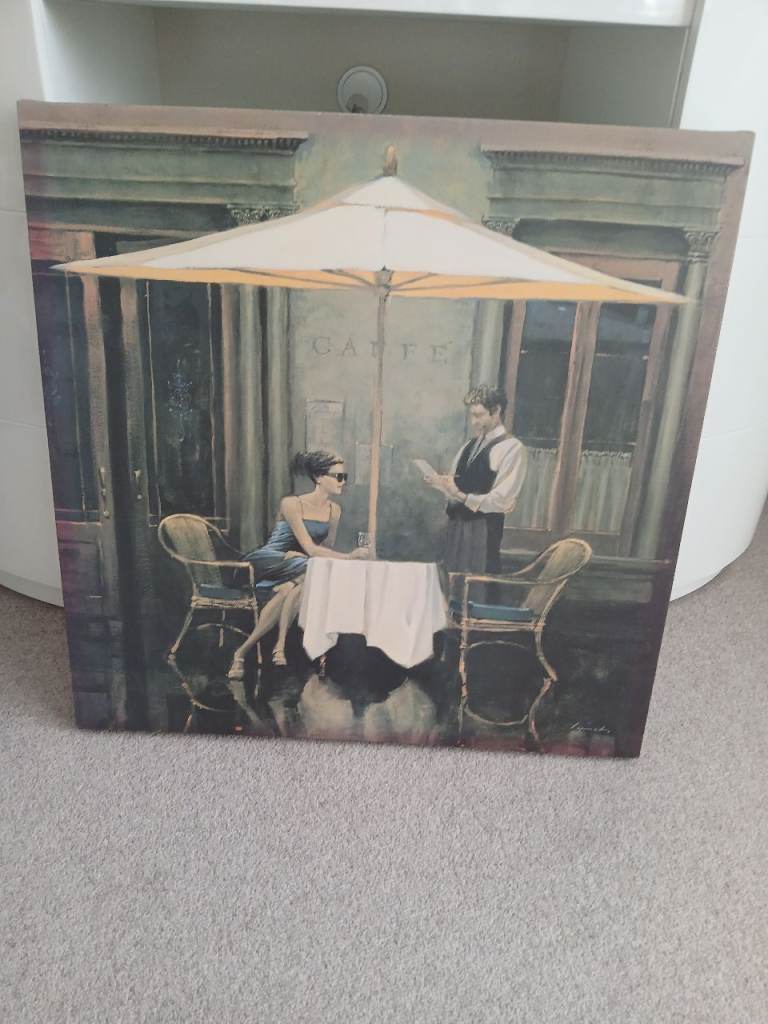 Lady outside cafe picture