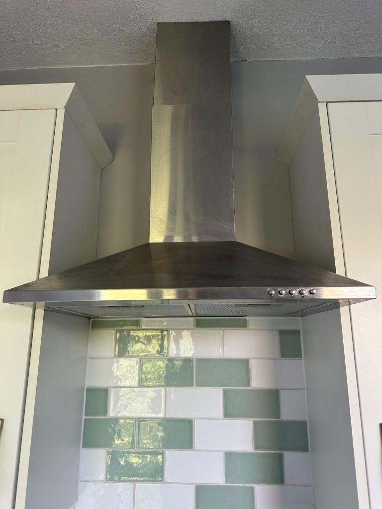 Extractor hood for over cooker