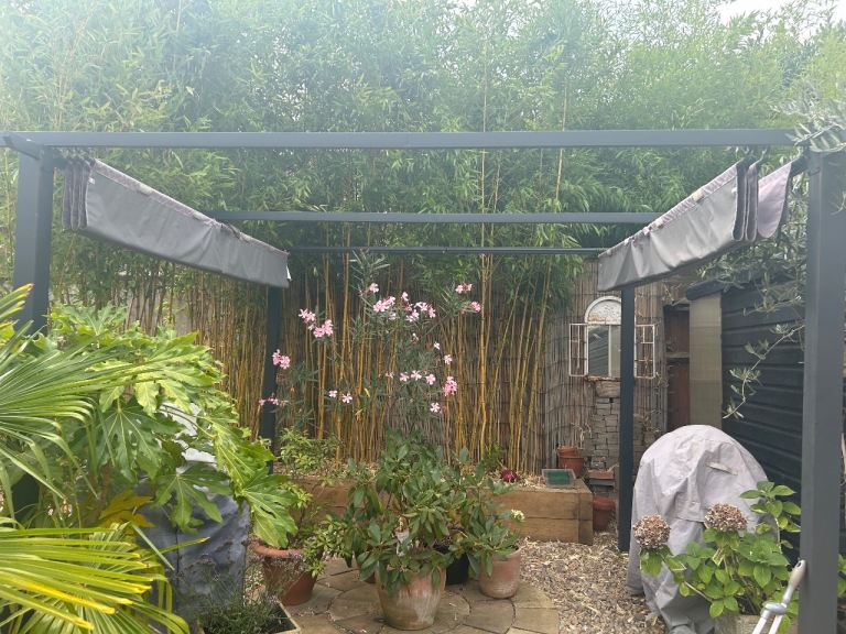 Dark grey pergola 