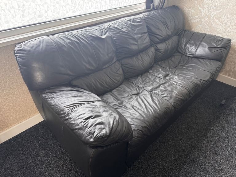 Dark brown DFS leather sofa 