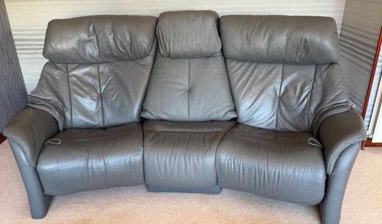 Himolla Cumuly leather 3 seater sofa with 2 outer seats being recliners 