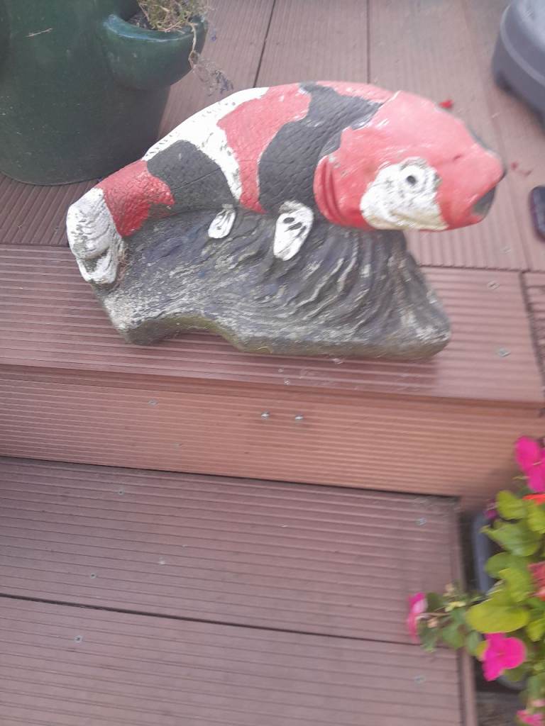 Koi pond statue 