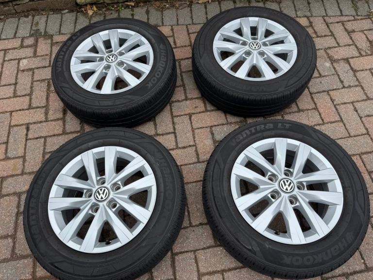 4 genuine VW Transporter T6.1 16" alloy wheels on 6.5J rims with good Hankook tyres