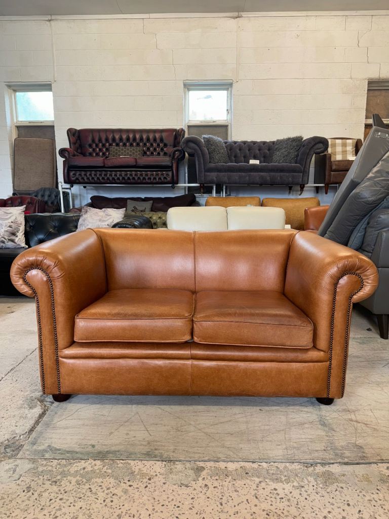 Chesterfield style tan real leather studded two seater sofa