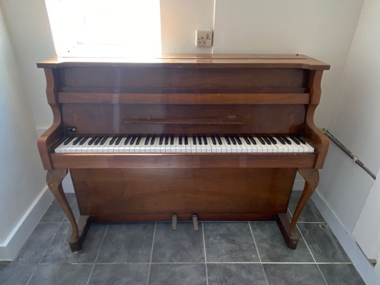 Lovely Wooden Upright Piano – Good Condition