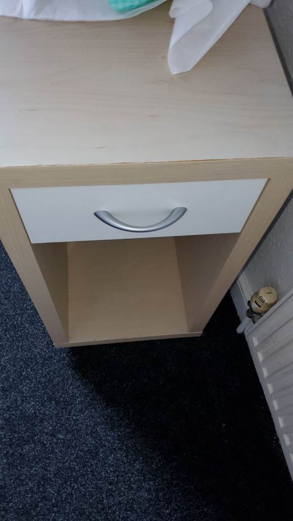 image for Bedside table on casters  in good condition 