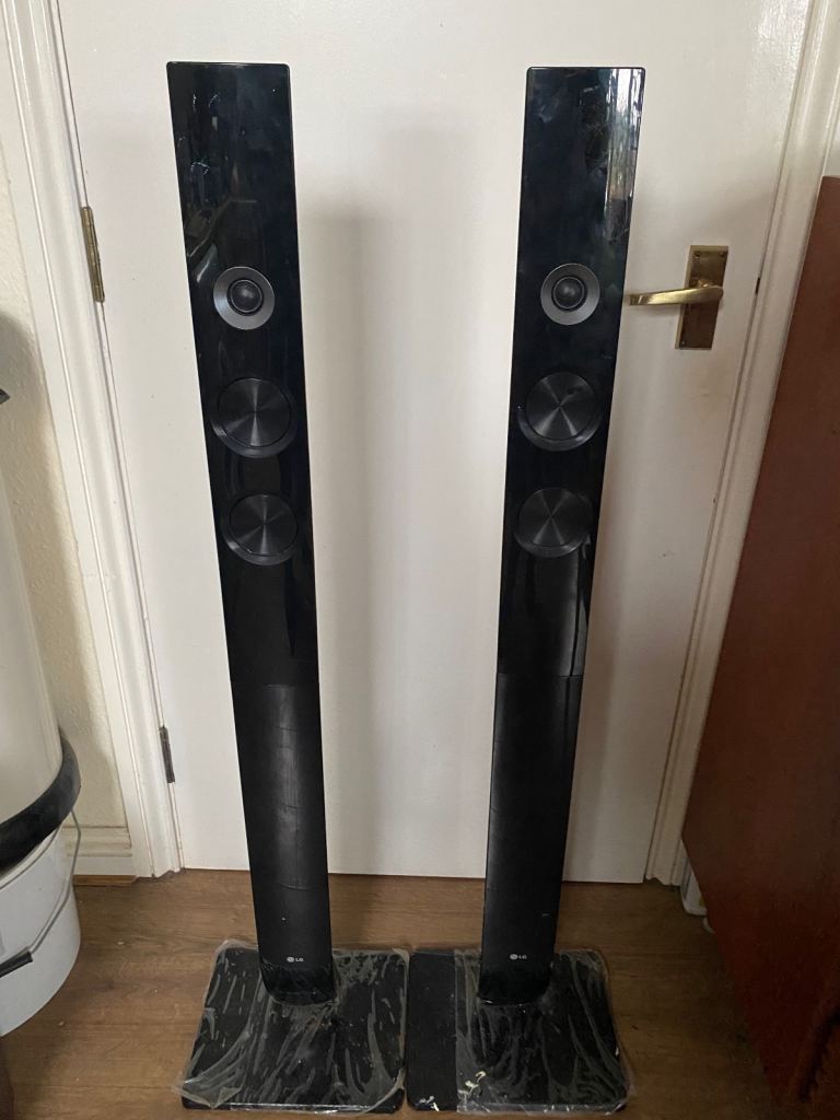 A pair of LG speakers surrounded 