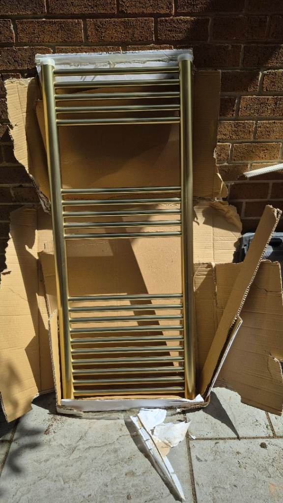 Solid brushed brass designer radiator