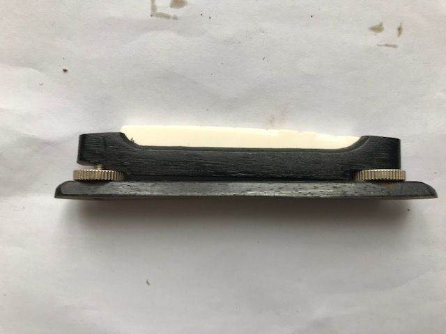 Guitar:Bridge:adjustable:Ebony base:Excellent condition.