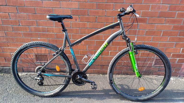 B'Twin Rockrider Big RR 5.1 Mountain City Bike – BIG lightweight aluminium frame , good brakes .