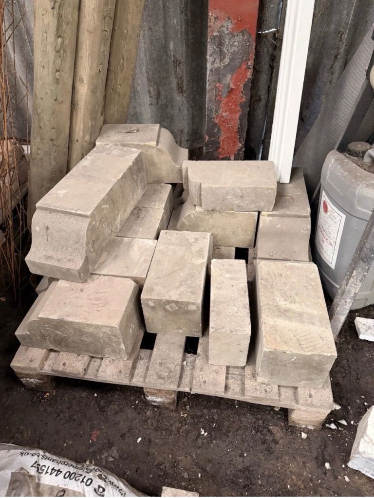 Stone gutter corbels