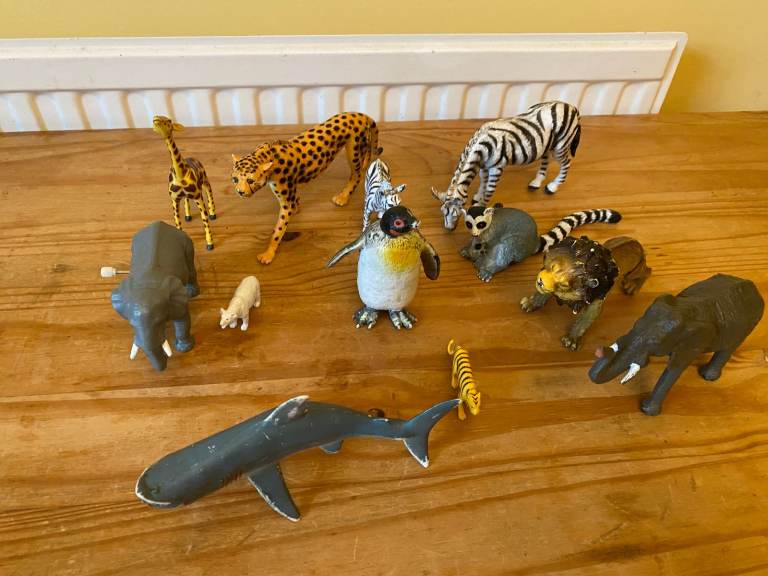 Dinosaurs and exotic wild animal toy figures