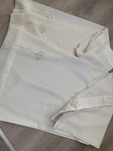 Pair cream curtains