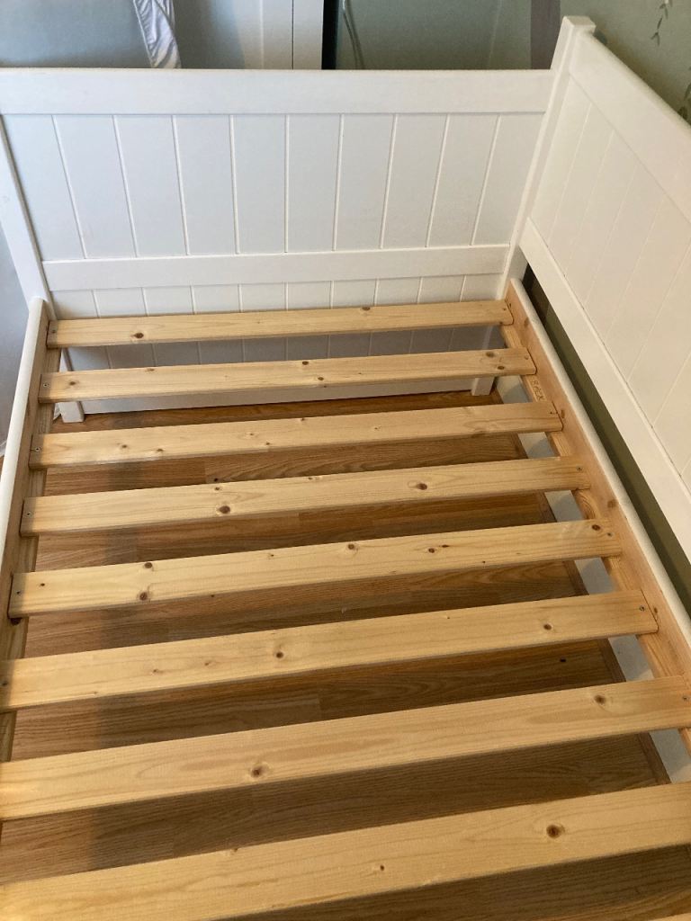 Single wooden day bed with drawers 