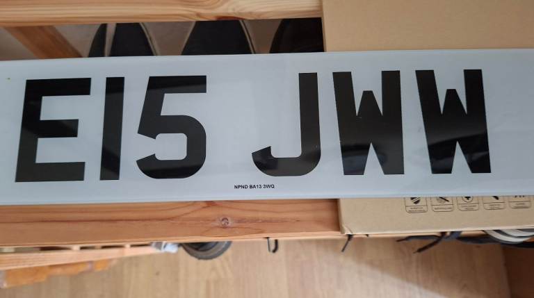 PRIVATE REGISTRATION PLATE E15JWW ON RETENTION CERTIFICATE 