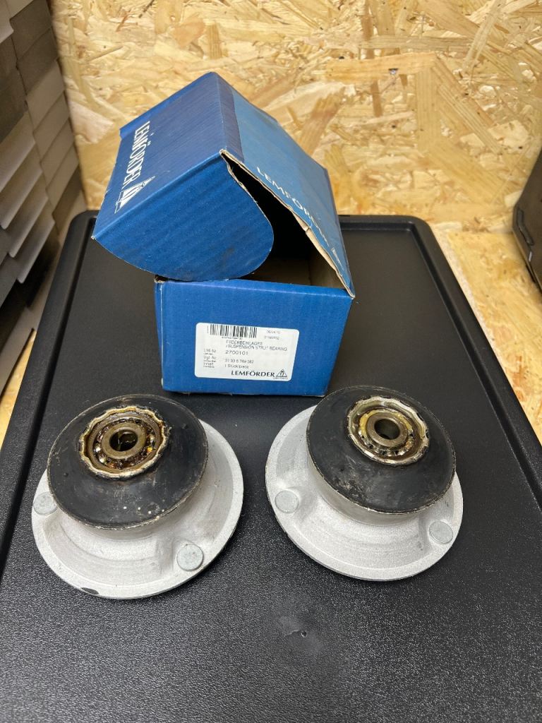 new, unused BMW top mounts