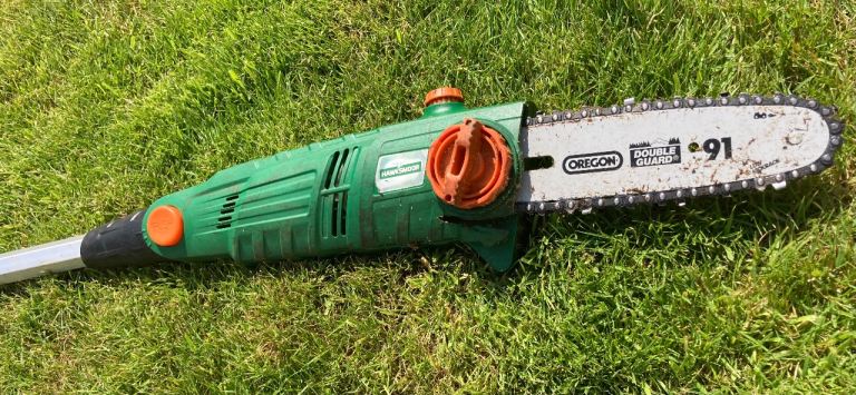 Extendable long reach chainsaw